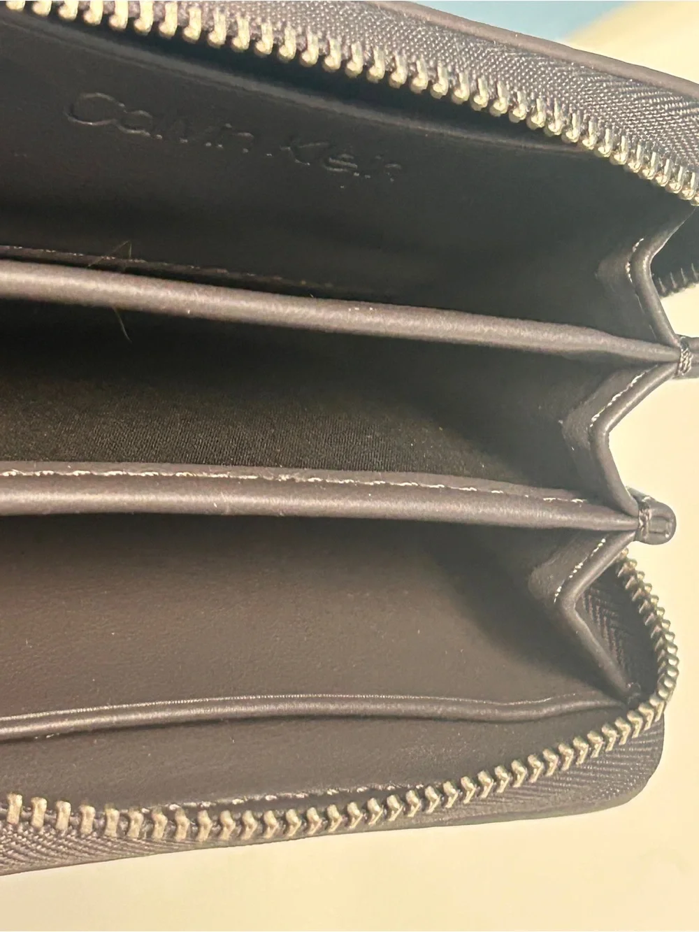 Calvin Klein gray pebbled leather zip wallet